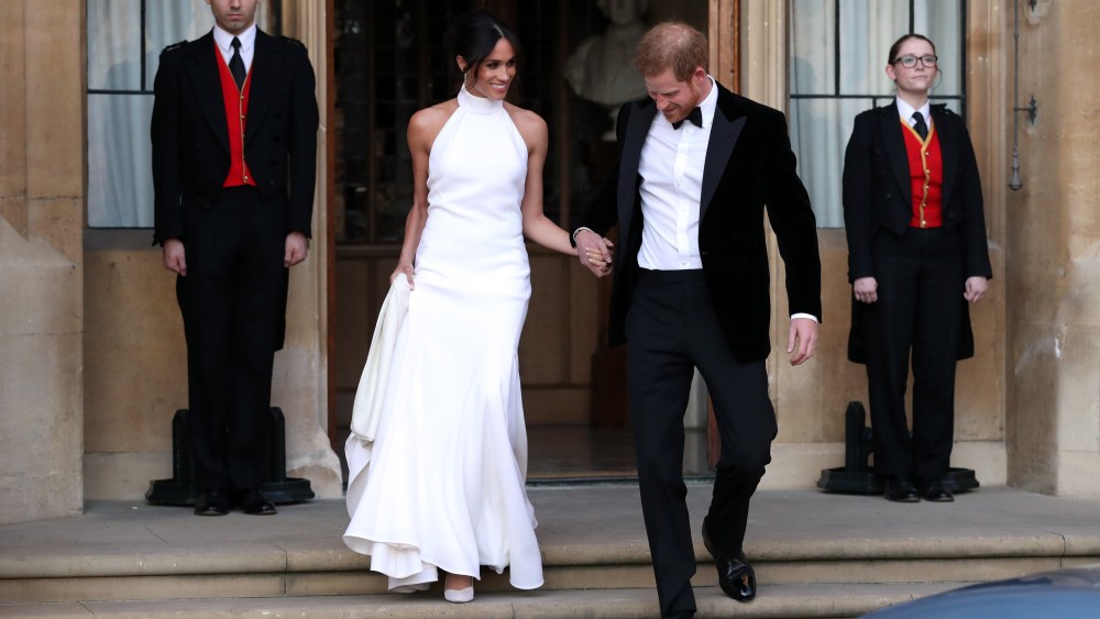 The newly married Duke and Duchess of Sussex, Meghan Markle and Prince Harry, leaving Windsor Castle after their wedding to attend an evening reception at Frogmore HouseThe wedding of Prince Harry and Meghan Markle, Open-top car, Windsor, Berkshire, UK - 19 May 2018