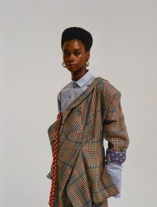 Snow Xue Gao’s wool blazer and cotton shirt. Jennifer Fisher earrings.