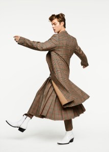 BurberryÕs cotton tank under Dries Van NotenÕs wool coat, merino sweatshirt, wool pants and skirt. Calvin Klein 205W39NYC boots, Established ring and Pyrrha rings.