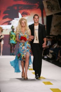 Paris Hilton and a model on the runway at Heatherette's spring 2007 show in New York, 2006.