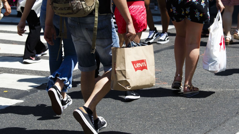 People carry shopping bags in New York, New York, USA, 01 August 2017. A report released today by the United States' Commerce Department showed moderate consumer spending growth in June of this year.US Consumer Spending, New York, USA - 01 Aug 2017