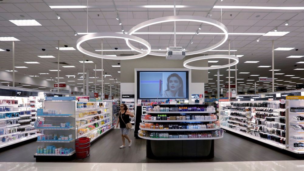 A shopper walks through the updated cosmetic department at a Target store in San Antonio. Success of specialty chains like Sephora and Ulta has pushed discounters like Walmart and Target as well as drugstores like CVS to revamp their cosmetics areas with more open spaces, brighter lighting and more attractive fixturesBeauty Battle, San Antonio, USA - 30 May 2018
