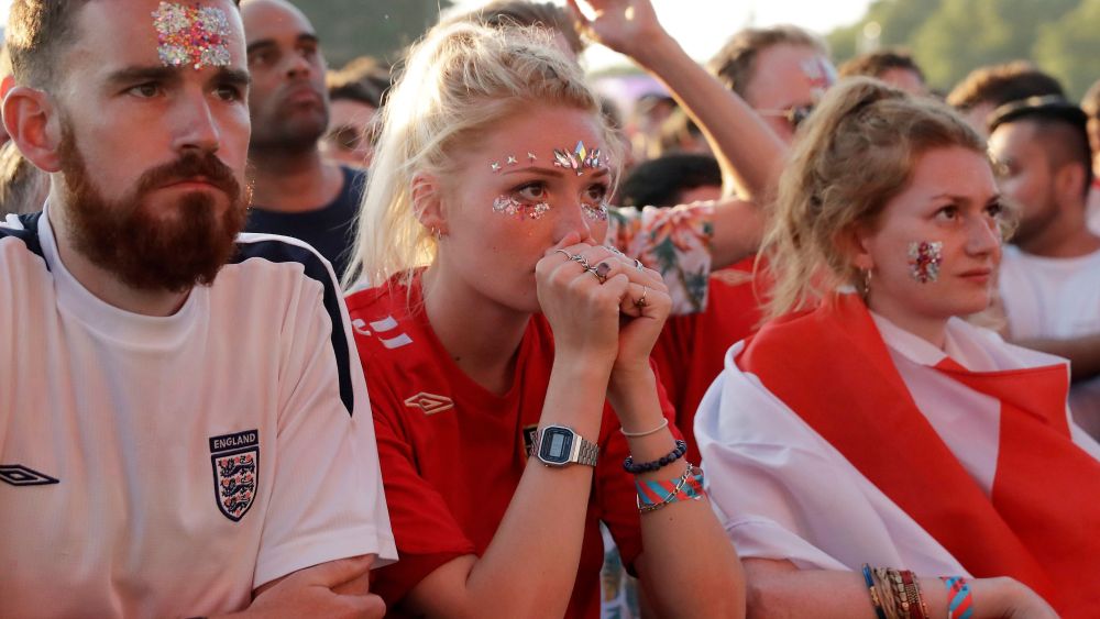 England soccer fans react as they watch a live broadcast on a big screen of the semifinal match between Croatia and England at the 2018 soccer World Cup, in Hyde Park, LondonBritain WCup Soccer England, London, United Kingdom - 11 Jul 2018