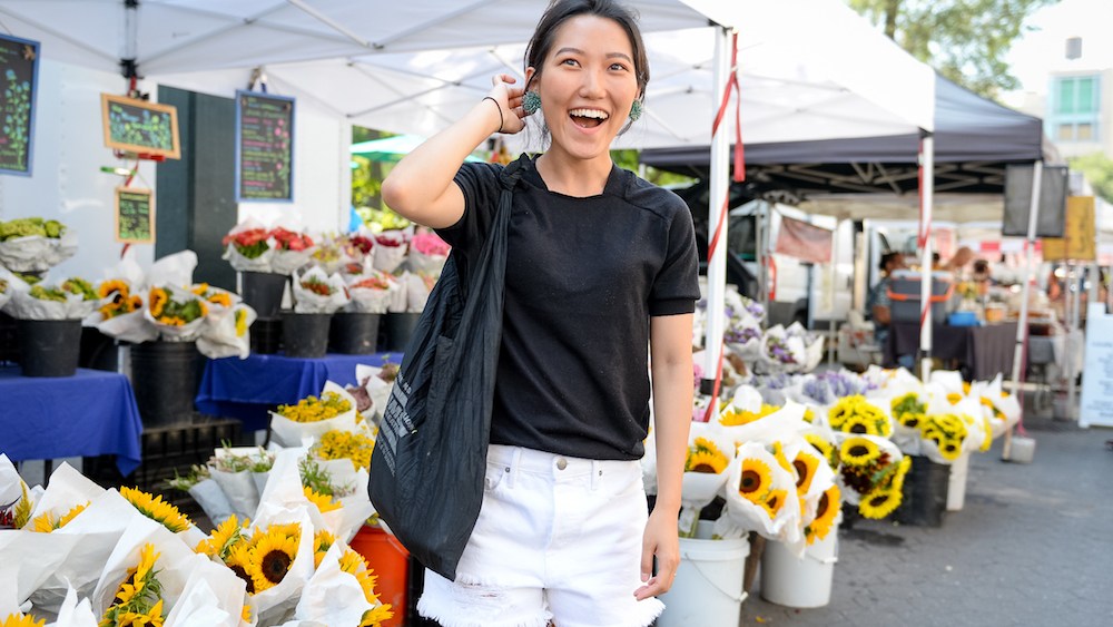 girl in shorts in flower market