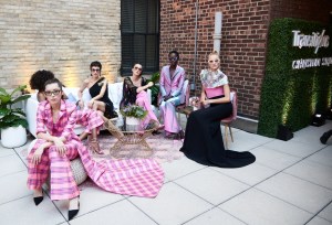 Models in Christian Siriano at the launch of Transitions Optical's new line of color choices and mirror effects.