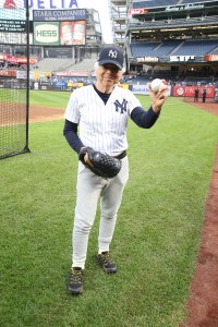 Ralph Lauren throws the opening pitch of the New York Yankees vs Boston Red Sox game in celebration of Ralph Lauren 50th anniversary.