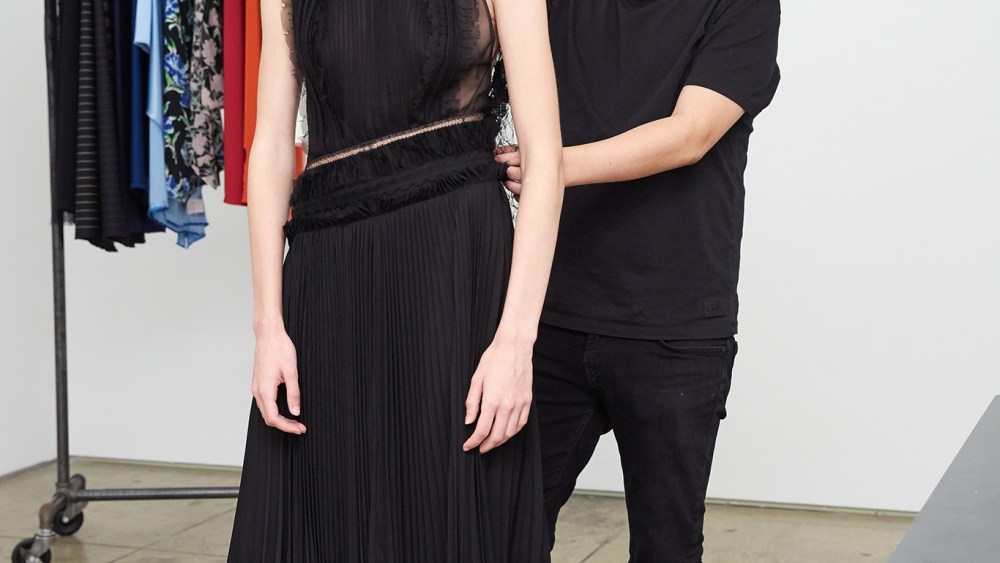 Jason Wu and model with look from Spring 2019 RTW.