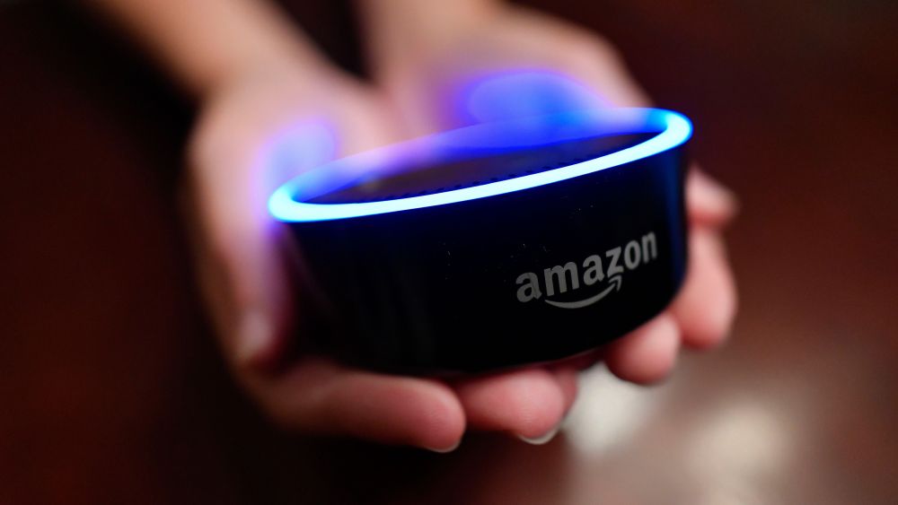 A child holds his Amazon Echo Dot in Kennesaw, Ga. Amazon updated its voice assistant with a feature that can make Alexa more kid-friendly. When the FreeTime feature is activated, Alexa answers certain questions differentlyAlexa Kids Test, Kennesaw, USA - 16 Aug 2018