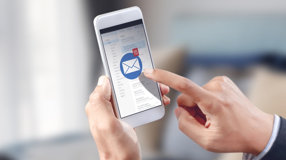 businessman hand touch email envelope icon on mobile screen