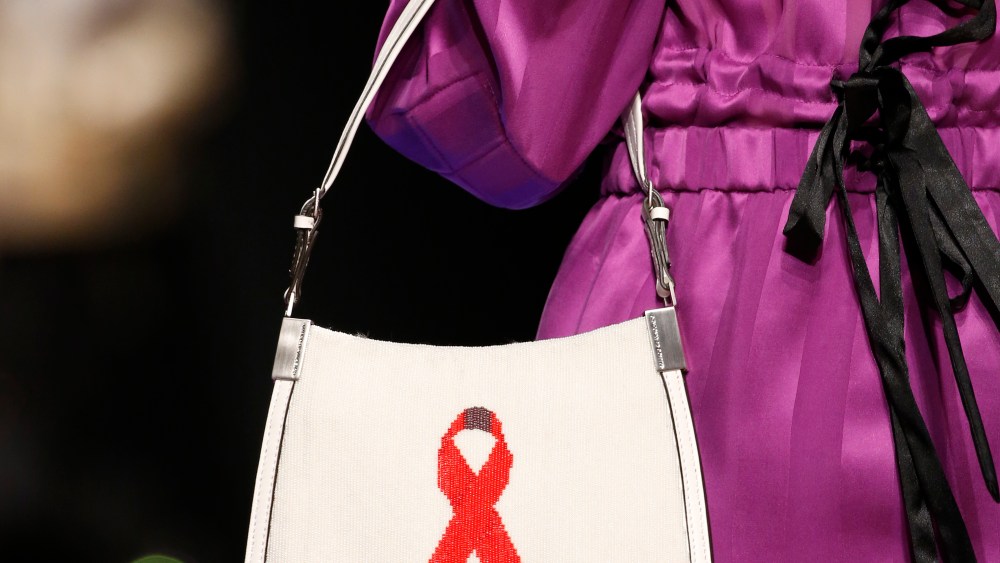 Marco De Vincenzo's "Starry" bag embellished with the red ribbon symbol.