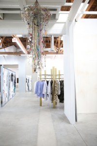 A view of the space and a chandelier by Lyn Dillin