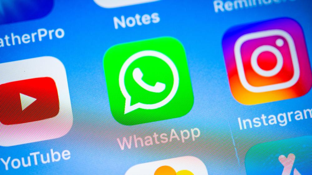 Whatsapp, messenger app icon on iPhone, iOS, smartphone screen, display, close-up, detail, GermanyVARIOUS