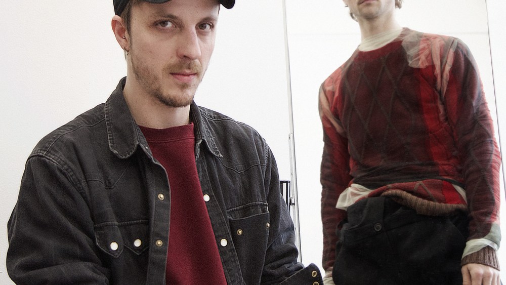 Glenn Martens and a model in a look from Y/Project.