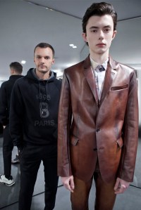 Kris Van Assche and one of his looks for Berluti Men's Fall 2019.