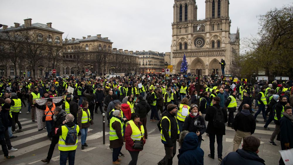 Protesters walk alongside the Seine river during a 'Yellow Vests' protest in Paris, France, 05 January 2019. The so-called 'gilets jaunes' (yellow vests) is a grassroots protest movement with supporters from a wide span of the political spectrum, that originally started with protest across the nation in late 2018 against high fuel prices. The movement in the meantime also protests the French government's tax reforms, the increasing costs of living and some even call for the resignation of French President Emmanuel Macron.Yellow vests protest in Paris, France - 05 Jan 2019