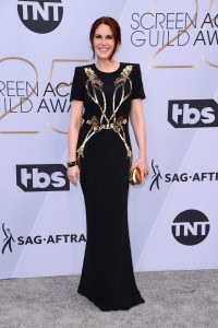 Megan Mullally in Alexander McQueen: Power flowers on the chicest LBD.