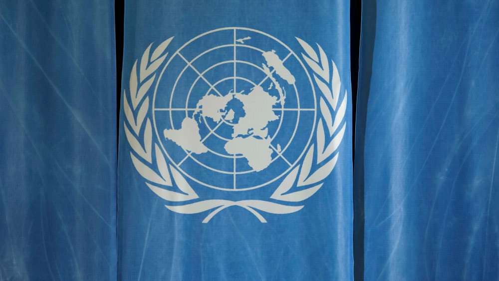 The UN logo at a press conference of United Nations Conference on Trade and Development (UNCTAD) in Geneva