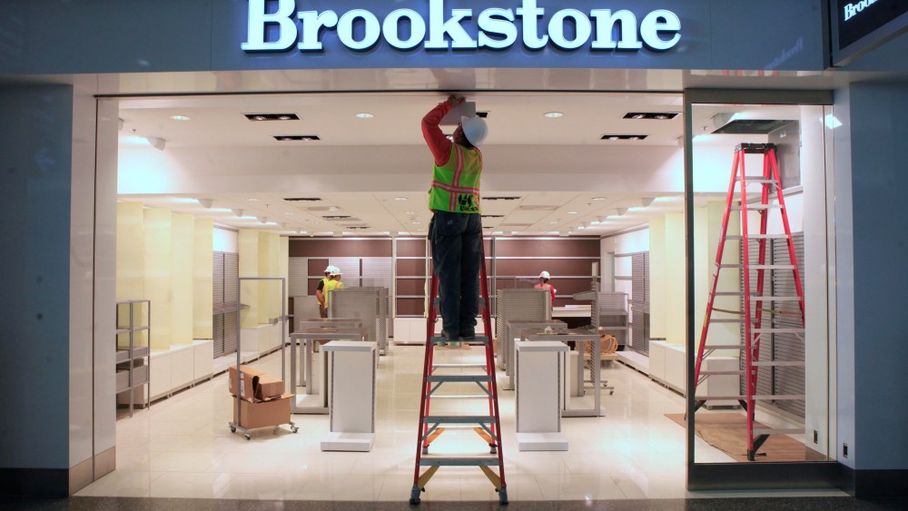 Work is done on a light fixture at the Brookstone shop at the new Terminal B at the Sacramento International Airport in Sacramento, Calif. The new $1 billion terminal, which is scheduled to open Thursday, Oct. 6, 2011 created 2,400 jobs during the 2 1/2 year construction project that officials say is the largest in Sacramento County's history, and is designed to expand the airport's capacity to 16 million passengers a yearSacramento Airport New Terminal, Sacramento, USA