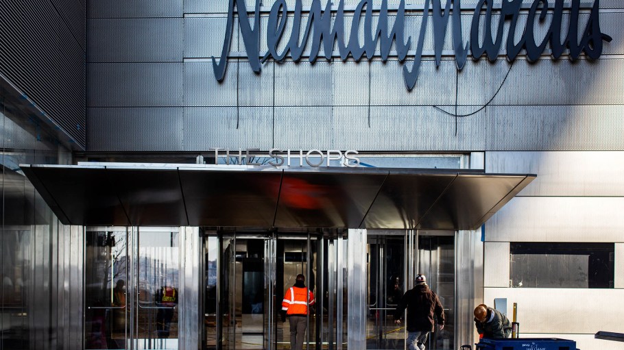A contractor enters the Neiman Marcus store at the Hudson Yards development in New York
