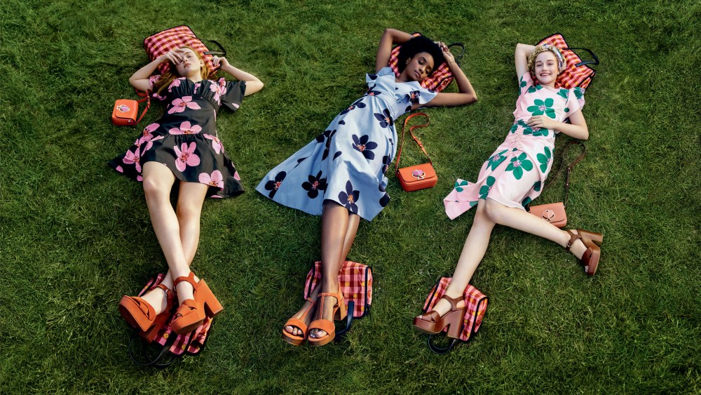 In her second collection for Kate Spade New York, launching in May, creative director Nicola Glass focuses on optimistic femininity. The summer campaign once again features actresses Julia Garner (Netflix’s “Ozark” and Bravo’s “Dirty John”) Sadie Sink (Netflix’s “Stranger Things” and “Eli”) and KiKi Layne (“If Beale Street Could Talk” and “Native Son.”). The campaign, styled by Sara Moonves, was photographed by Tim Walker, who previously worked with the brand from 1999 to 2006 under Kate and Andy Spade. He will shoot the brand’s campaigns throughout 2019. “I love the idea of women getting together and creating everyday informal celebrations, no matter where they are,” said Glass. “To me, the nature of improvising these moments is very free-spirited and optimistic. As a brand, we encourage women to be the heroines of their own stories. We are a celebration of women across time zones, generations and style creeds who are living their best individual lives and believe that, together, everything is possible.” The ads, which will start appearing digitally in May, were shot on location at the Floating Farmhouse in Eldred, N.Y. — Lisa Lockwood