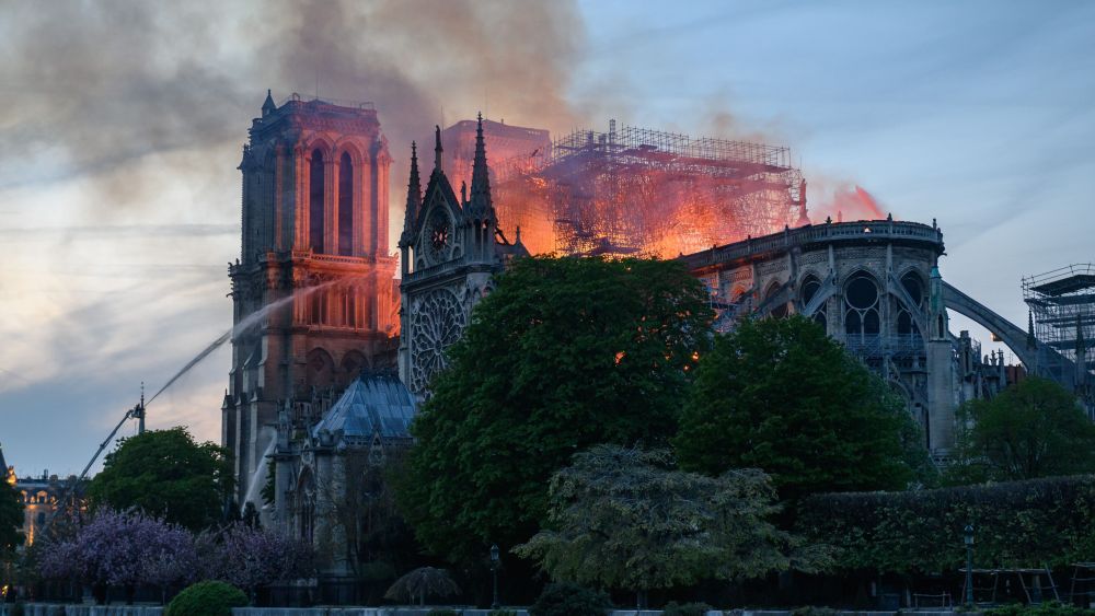 Flames rise from Notre Dame cathedral as it burns.Notre-Dame Cathedral Fire, Paris, France - 15 Apr 2019