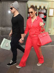 Jennifer Lopez and Casper SmartJennifer Lopez out and about, London, Britain - 24 Oct 2012J-Lo and her two children were spotted leaving their hotel before heading off to Harrods. She was sporting a Hot Tamale (red) Victoria's Secret fleece hoody and matching trousers, topped off with a Hermes Birkin handbag. The hoody and trousers cost $120. Emme carried a white tiger toy in a Gucci bag. Lopez left the store holding hands with her boyfriend Casper Smart and was greeted by a crowd who had gathered, along with a 'healthy' amount of photographers
