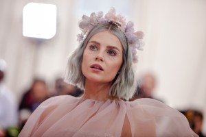 Lucy Boynton in Prada.