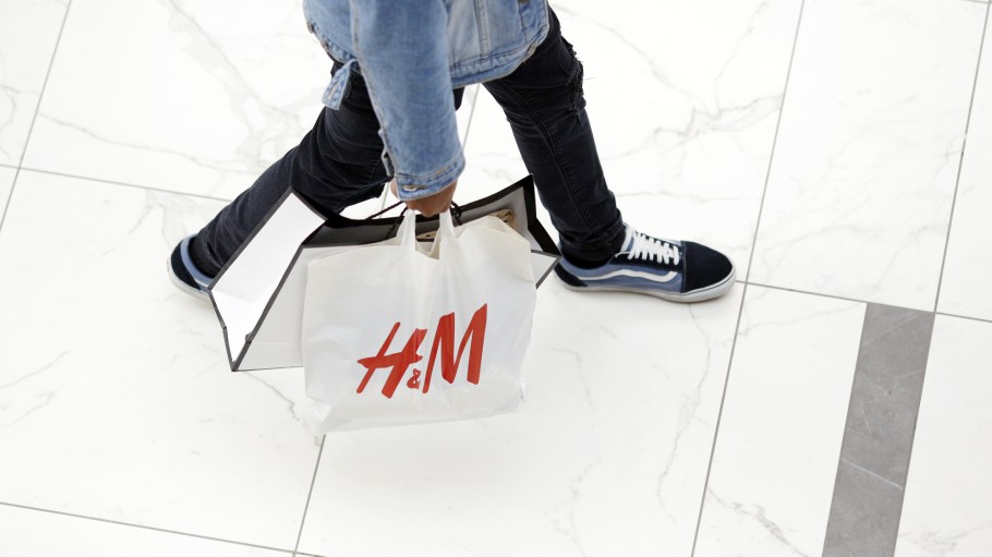 A shopper carries a Hennes & Mauritz AB (H&M) bag at the Easton Town Center Mall in Columbus, Ohio,
