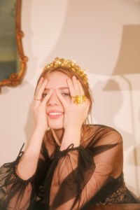 Christian Dior’s embroidered tulle dress. Lelet NY tiara; Christian Dior ring; Vita Fede ring.
