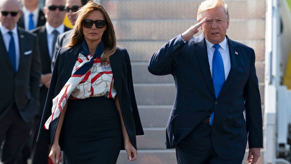 US President Donald J. Trump (R) salutes and First Lady Melania Trump (L) as they arrive at London Stansted Airport in Essex, Britain, 03 June 2019. US President Trump and First Lady Trump are on a three-day state visit to the United Kingdom.State visit of US President Donald J. Trump to United Kingdom, Stanstead - 03 Jun 2019