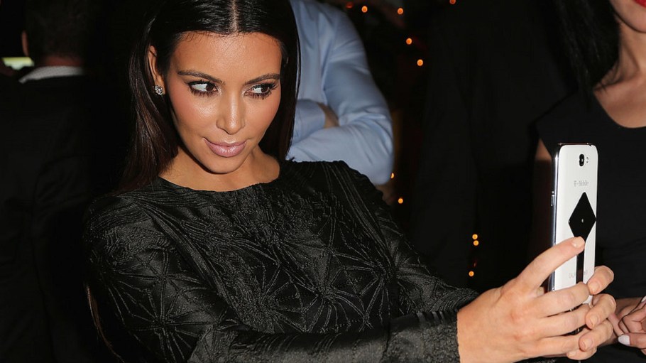 Kim Kardashian enjoys the interactive experience at Samsung Galaxy Note II Presents: The Next Big Thing & The Ring at Soho Beach House Miami on October 30, 2012 in Miami Beach, Florida.