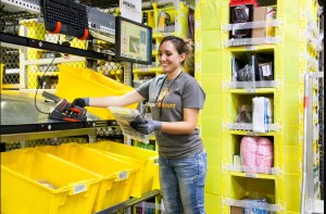 An employee picking at an Amazon fulfillment center.