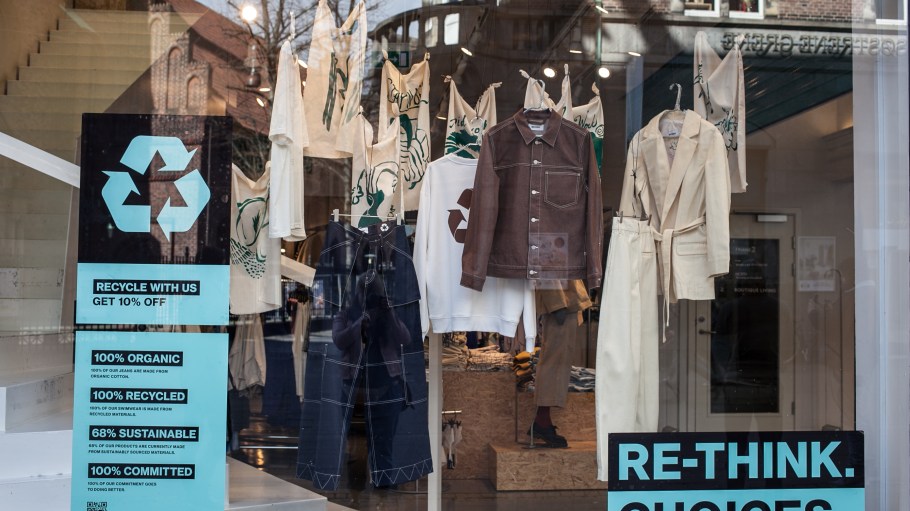 Sweden, Stockholm, March 2019. Storefront with clothes made from recycled materials. The concept of zero pollution and eco-friendly lifestyle acute social problems