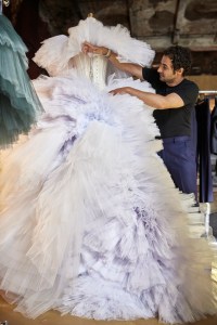 Posen shows the corseted foundation of his tulle wonder.