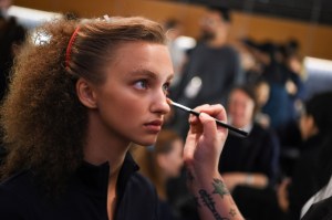 Guido Palau for Revlon couldn't find the hair combs he wanted to create the Eighties English Lady vibe he was going for, so he spray-painted plain ones himself. "I couldn't believe I couldn't find them, I thought they'd be everywhere,Ó Palau said. Ñ Ellen Thomas