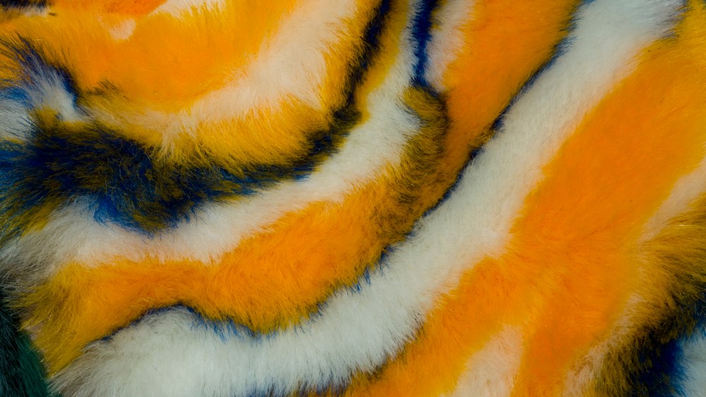 A faux fur in a twisted animal print by Jules Tournier Since 1865.