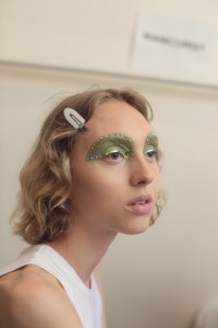 Makeup lead Pat McGrath for Marc Jacobs Beauty brought her otherworldly powers to make makeup magic for Marc Jacobs. McGrath created a Òmodern take on street style,Ó she said, working with hair lead Guido Palau to craft 60 individual looks for each model. Smokey eyes, bedazzled eyelids and dramaticized lashes reflected both the past and the future. Ñ Alexa Tietjen
