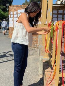 Meghan Duchess of Sussex ties a ribbon at the site where 19 year old Cape Town student Uyinene Mrwetyana was murdered last month, to pay her respects and to show solidarity with those who have taken a stand against gender based violence and femicide. Over the last month in Cape Town, protests erupted through the streets in outrage over GBV in South Africa.Prince Harry and Meghan Duchess of Sussex visit to Africa - 26 Sep 2019The Duke and Duchess had been following what had happened from afar and were both eager to learn more when they arrived in SOuth Africa. The Duchess spoke to the mother of Uyinene this week to relay their condolences. The Duke and Duchess had been following what had happened from afar and were both eager to learn more when they arrived in South Africa. The Duchess spoke to the mother of Uyinene this week to relay their condolences.