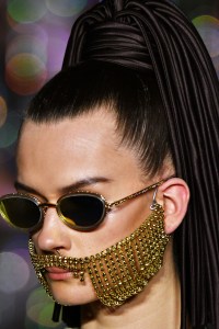 Chandelier makeup was all the rage at Area. The look was created by Kanako Tasaki for Addiction, a Japanese line. She cast models in something of a coral glow using a shade of blush, with highlighter on cheekbones of the women playing men Ñ those models sported chandelier-looking "beards," she noted. Others had strips of rhinestones glued around the eye and brow area using makeup glue. The selfies were everywhere. Ñ Allison Collins