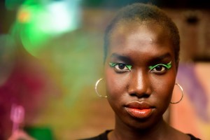 Romy Soleimani for Bobbi Brown swiped a custom shade of pistachio across lids, and kept the rest of the look colorful with coral blush and a bright orange lip. Ñ Ellen Thomas
