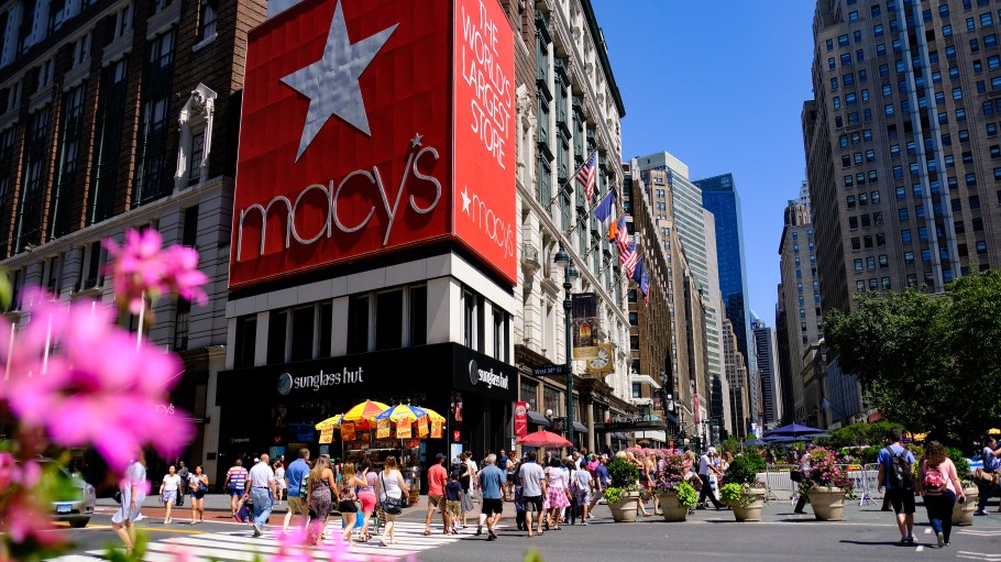 Macy's Herald Square Flagship Department Store in Midtown Manhattan with people crossing the street in front of it