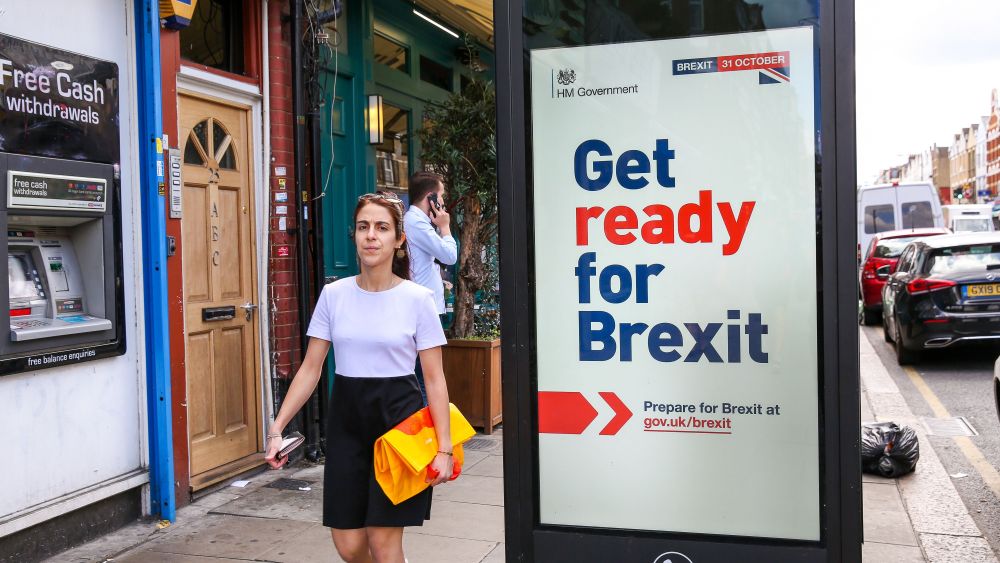 A woman walks past the new 'Get ready for Brexit' advert on a telephone box in north London. Today, the UK Government launches its £100m "Prepare for Brexit" advertising campaign to reassure the nation ahead of a potential no-deal departure from the European Union on 31 October.Government's £100m Brexit campaign, London, UK - 01 Sep 2019