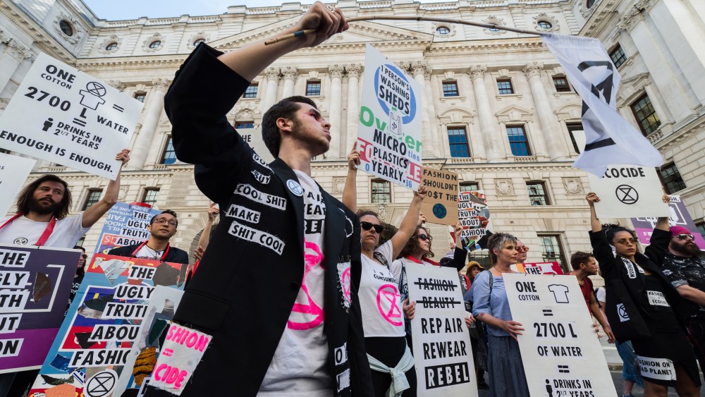 Extinction Rebellion activists demonstrate outside the Foreign Office ahead of Victoria Beckham's show at the London Fashion Week. Protesters call for the British Fashion Council to cancel London Fashion Week until it can be sustainable in the face of climate crisis and ecological emergency.Extinction Rebellion protest, London Fashion Week, London, UK - 15 Sep 2019