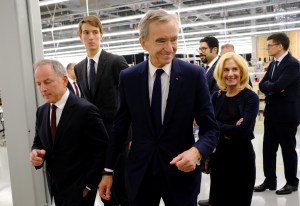 Michael Burke and Bernard Arnault at the Louis Vuitton Factory in Texas.