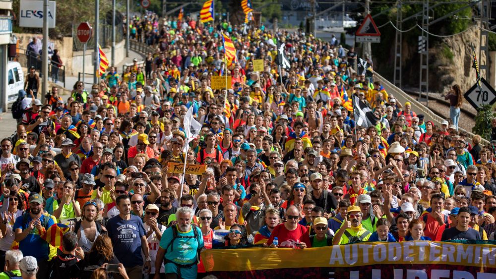 Catalan pro-independence demonstrators march as they arrive at Arenys de Mar, near Girona, Spain, . Thousands of people have joined five large protest marches across Catalonia that are set to converge on Barcelona, as the restive region reels from three straight days of violent clashes between police and protesters. The marches set off from several Catalan towns and aimed to reach the Catalan capital by FridayCatalonia, Arenys de Mar, Spain - 17 Oct 2019