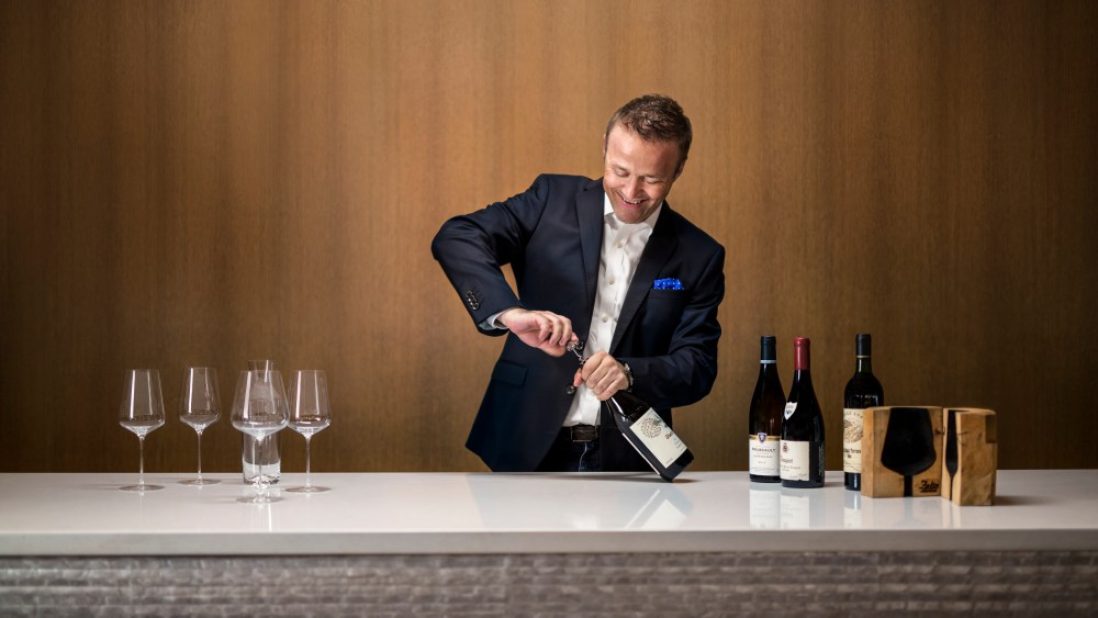 Sommelier Aldo Sohm conducting a wine tasting in the dining room of Prive by Le Bernardin, NYC