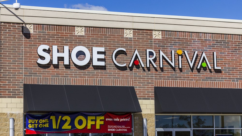 Shoe Carnival's positive third-quarter led the footwear retailer to upgrade its full-year outlook in both earnings and net sales.