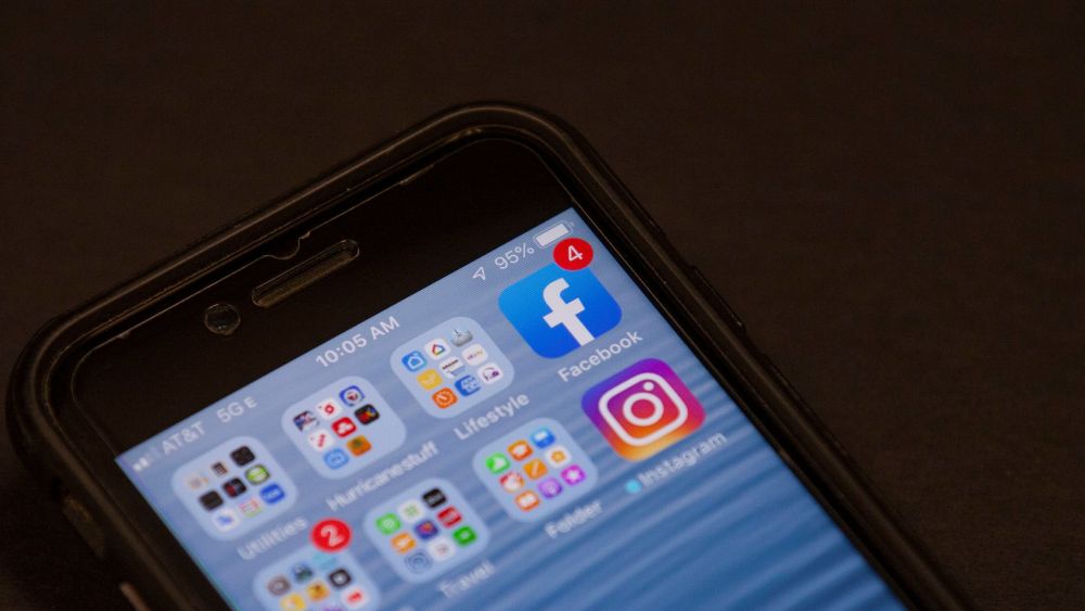A Facebook app is shown on a smartphone in Miami. Facebook reports financial earns on Wednesday, Oct. 30Earns Facebook, Miami, USA - 29 Oct 2019