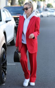 Hailey Baldwin, red blazer, staud bag, balenciaga pantsuit, red pants, nike air force 1, sneakers, white shoes, celebrity style, los angeles, december 2019 , Hailey BieberHailey Rhode Bieber out and about, Los Angeles, USA - 02 Dec 2019Wearing Balenciaga Same Outfit as catwalk model *10128914f, Bag By Staud