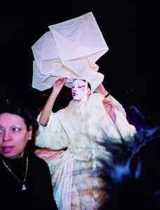 A model getting ready for the ÒAsian AdventureÓ spring-summer 2003 haute couture runway.